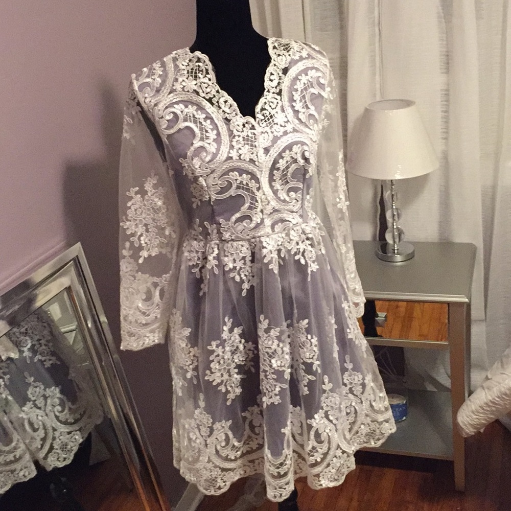 Gorgeous lace dress- with built in grey underneath